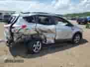 2014 Ford Escape SE z VIN 1FMCU0GX1EUD14689, wystawiony jako Copart lot #65897645 z przebiegiem 125 022 mil mil oraz Szkoda całkowita • Salvage title. Historia ofert i sprzedaży dostępna na DreamBid. Obrazek 3.