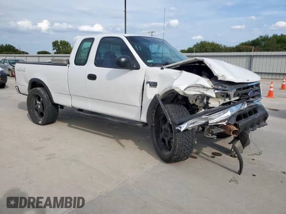 2000 Ford F-150 XL with VIN 1FTRX18L7YNB50273, listed as a Copart auction lot 70456245 with Not provided miles and Salvage title. Bid and sale history available at DreamBid. Image 4.