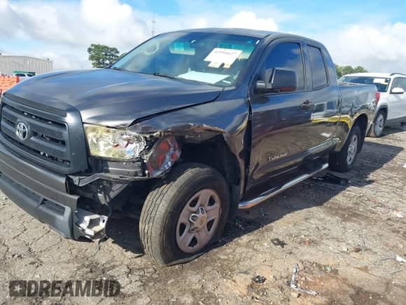 2012 Toyota Tundra z VIN 5TFRU5F14CX026640, wystawiony jako IAAI lot #42994627 z przebiegiem 310 619 mil mil oraz . Historia ofert i sprzedaży dostępna na DreamBid. Obrazek 17.