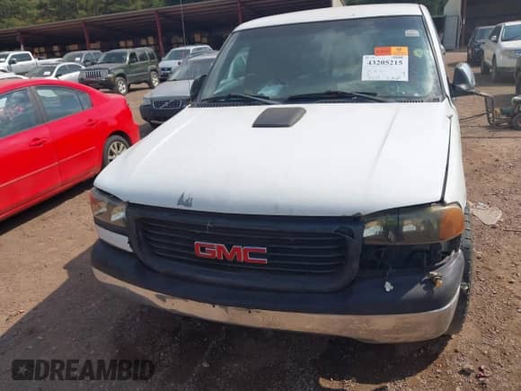 2002 GMC Sierra 1500 SL z VIN 1GTEC14V62Z900828, wystawiony jako IAAI lot #43205215 z przebiegiem Nie podano mil oraz . Historia ofert i sprzedaży dostępna na DreamBid. Obrazek 6.