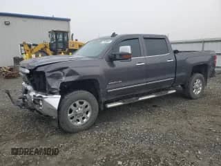 2015 Chevrolet Silverado 3500HD LTZ с VIN 1GC4K0C82FF676758, выставлен на аукционе Copart как лот 77458684 с пробегом 173 579 миль миль и Списание • Salvage title. История ставок и продаж доступна на DreamBid. Изображение 1.