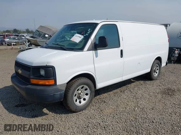 2013 Chevrolet Express Cargo with VIN 1GCSGAFX0D1160359, listed as a IAAI auction lot 43115960 with 343,694 mi miles and . Bid and sale history available at DreamBid. Image 2.
