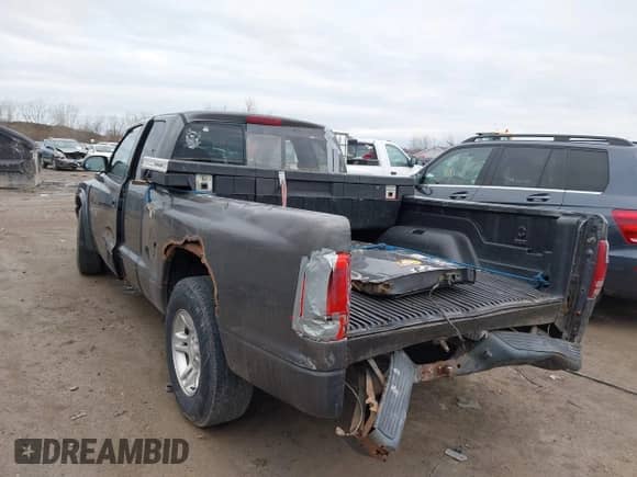 2002 Dodge Dakota с VIN 1B7GL12X22S644306, выставлен на аукционе IAAI как лот 41826999 с пробегом 198 069 миль миль и . История ставок и продаж доступна на DreamBid. Изображение 3.