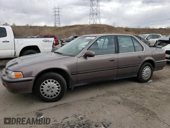 1993 Honda Accord LX z VIN JHMCB7652PC009471, wystawiony jako Copart lot #47173745 z przebiegiem 126 397 mil mil oraz Czysty tytuł • Clean title. Historia ofert i sprzedaży dostępna na DreamBid. Obrazek 1.