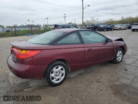 2002 Saturn SC with VIN 1G8ZY12732Z176596, listed as a Copart auction lot 50506894 with Not provided miles and Salvage title. Bid and sale history available at DreamBid. Image 3.
