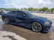 2014 Dodge Charger SRT-8 с VIN 2C3CDXEJ9EH277605, выставлен на аукционе Copart как лот 58213825 с пробегом 111 635 миль миль и Списание • Salvage title. История ставок и продаж доступна на DreamBid. Изображение 4.