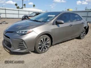 2019 Toyota Corolla L z VIN 5YFBURHE9KP909252, wystawiony jako Copart lot #68344355 z przebiegiem 139 657 mil mil oraz Szkoda całkowita • Salvage title. Historia ofert i sprzedaży dostępna na DreamBid. Obrazek 1.