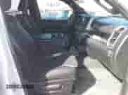 2023 Ram 1500 Tradesman with VIN 1C6RRFCG3PN677878, listed as a IAAI auction lot 41685205 with 19,225 mi miles and . Bid and sale history available at DreamBid. Image 5.