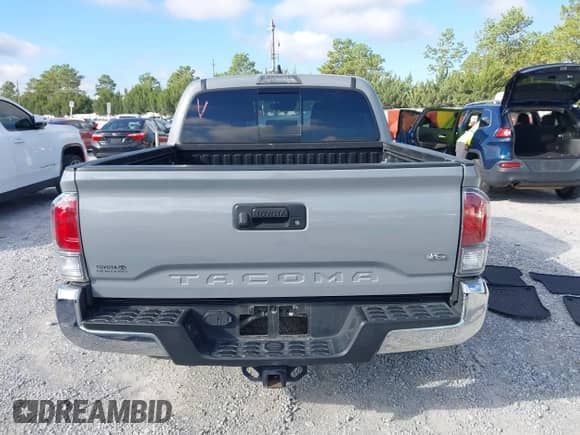 2021 Toyota Tacoma SR with VIN 3TYCZ5ANXMT024937, listed as a IAAI auction lot 43314888 with 77,580 mi miles and . Bid and sale history available at DreamBid. Image 16.