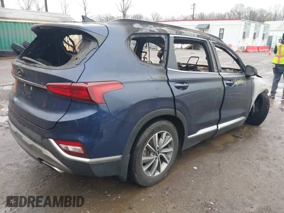 2019 Hyundai Santa Fe SEL with VIN 5NMS33AD8KH015271, listed as a IAAI auction lot 41509318 with Not provided miles and . Bid and sale history available at DreamBid. Image 4.