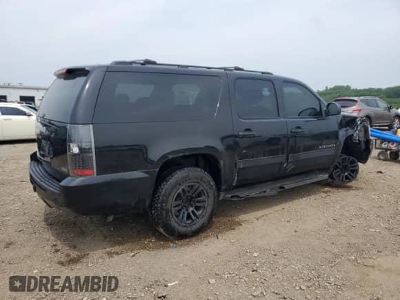 2011 Chevrolet Suburban LS with VIN 1GNSKHE32BR107058, listed as a Copart auction lot 60707125 with 153,407 mi miles and Salvage title. Bid and sale history available at DreamBid. Image 3.