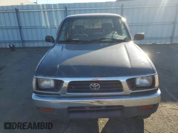 1997 Toyota Tacoma z VIN 4TAWM72N4VZ324227, wystawiony jako Copart lot #50633325 z przebiegiem 296 625 mil mil oraz Czysty tytuł • Clean title. Historia ofert i sprzedaży dostępna na DreamBid. Obrazek 5.