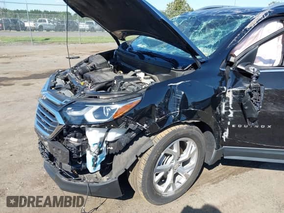 2021 Chevrolet Equinox Premier z VIN 2GNAXXEV4M6144507, wystawiony jako IAAI lot #43070178 z przebiegiem 43 748 mil mil oraz . Historia ofert i sprzedaży dostępna na DreamBid. Obrazek 6.