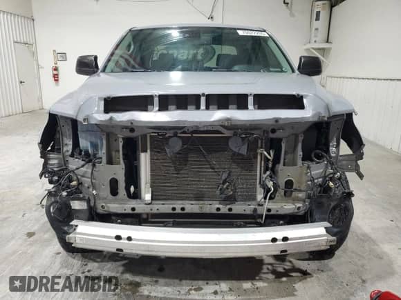 2020 Toyota Tundra SR5 with VIN 5TFEY5F14LX261476, listed as a Copart auction lot 70022205 with 180,181 mi miles and Salvage title. Bid and sale history available at DreamBid. Image 5.