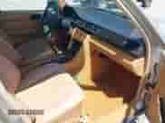 1986 Mercedes-Benz 300 E z VIN WDBEA30DXGA214357, wystawiony jako IAAI lot #42517226 z przebiegiem 169 670 mil mil oraz . Historia ofert i sprzedaży dostępna na DreamBid. Obrazek 5.