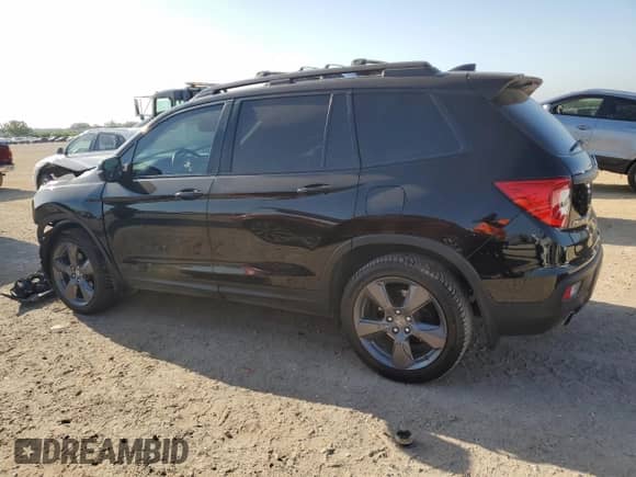 2019 Honda Passport Touring with VIN 5FNYF7H94KB002027, listed as a Copart auction lot 52911455 with 51,813 mi miles and Salvage title. Bid and sale history available at DreamBid. Image 2.