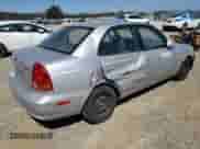 2003 Hyundai Accent GL z VIN KMHCG45CX3U474856, wystawiony jako Copart lot #67615445 z przebiegiem 205 400 mil mil oraz Szkoda całkowita • Salvage title. Historia ofert i sprzedaży dostępna na DreamBid. Obrazek 3.