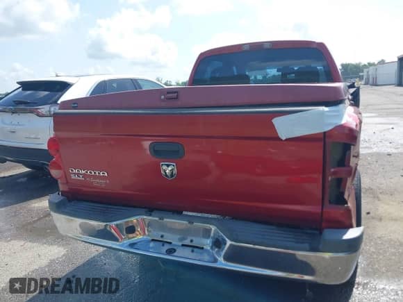 2006 Dodge Dakota SLT z VIN 1D7HE48K46S504359, wystawiony jako IAAI lot #42542706 z przebiegiem 91 072 mil mil oraz . Historia ofert i sprzedaży dostępna na DreamBid. Obrazek 17.