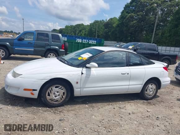 1999 Saturn SC with VIN 1G8ZY1270XZ314215, listed as a IAAI auction lot 42468782 with 152,264 mi miles and . Bid and sale history available at DreamBid. Image 14.