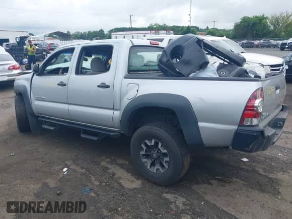 2009 Toyota Tacoma PreRunner z VIN 3TMJU62N99M077383, wystawiony jako IAAI lot #42670811 z przebiegiem 168 908 mil mil oraz . Historia ofert i sprzedaży dostępna na DreamBid. Obrazek 3.