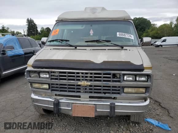 1992 Chevrolet Chevy Van с VIN 1GBEG25K2N7130047, выставлен на аукционе Copart как лот 68682724 с пробегом 143 585 миль миль и Списание • Salvage title. История ставок и продаж доступна на DreamBid. Изображение 5.