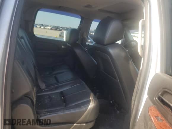 2012 Chevrolet Suburban LT с VIN 1GNSKJE72CR322418, выставлен на аукционе Copart как лот 65400575 с пробегом 255 685 миль миль и Списание • Salvage title. История ставок и продаж доступна на DreamBid. Изображение 11.