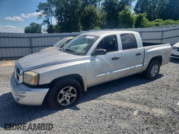 2007 Dodge Dakota SLT с VIN 1D7HE48P17S164732, выставлен на аукционе Copart как лот 80075525 с пробегом 230 632 миль миль и Списание • Salvage title. История ставок и продаж доступна на DreamBid. Изображение 1.