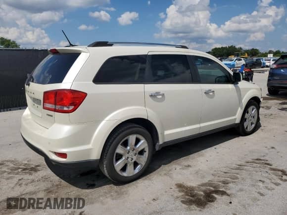 2013 Dodge Journey Crew with VIN 3C4PDDDG5DT682870, listed as a Copart auction lot 69202775 with 158,934 mi miles and Salvage title. Bid and sale history available at DreamBid. Image 3.