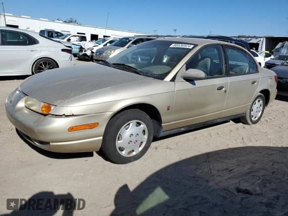 2000 Saturn SL with VIN 1G8ZG5287YZ224435, listed as a Copart auction lot 80536924 with 239,354 mi miles and Salvage title. Bid and sale history available at DreamBid. Image 1.