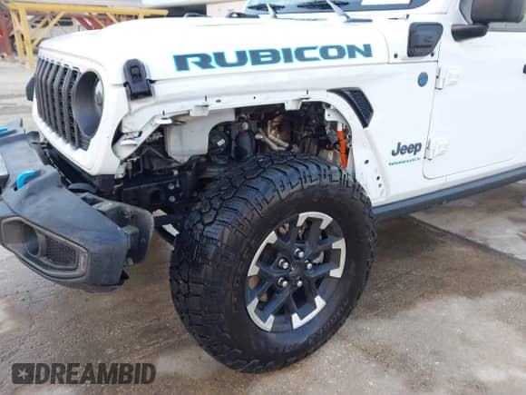 2024 Jeep Wrangler Rubicon z VIN 1C4RJXR60RW223430, wystawiony jako IAAI lot #43533970 z przebiegiem 53 374 mil mil oraz . Historia ofert i sprzedaży dostępna na DreamBid. Obrazek 21.