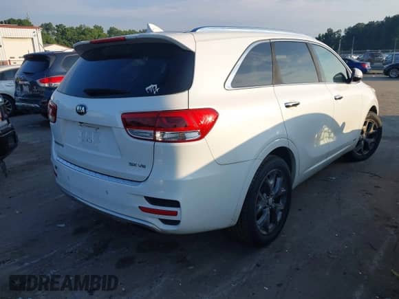 2016 Kia Sorento SXL z VIN 5XYPKDA57GG146717, wystawiony jako IAAI lot #43018518 z przebiegiem 180 078 mil mil oraz . Historia ofert i sprzedaży dostępna na DreamBid. Obrazek 4.