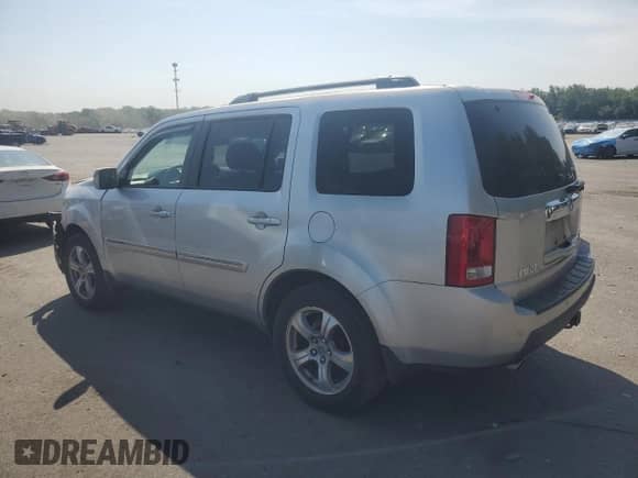 2009 Honda Pilot Touring with VIN 5FNYF48829B024561, listed as a Copart auction lot 66168365 with 150,536 mi miles and Salvage title. Bid and sale history available at DreamBid. Image 2.