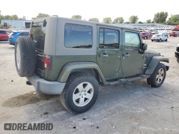 2007 Jeep Wrangler Unlimited Sahara z VIN 1J4GA59187L104520, wystawiony jako Copart lot #86331095 z przebiegiem 213 087 mil mil oraz Czysty tytuł • Clean title. Historia ofert i sprzedaży dostępna na DreamBid. Obrazek 3.