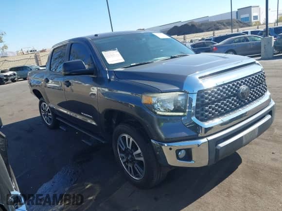2018 Toyota Tundra SR5 z VIN 5TFEM5F13JX126580, wystawiony jako IAAI lot #43546186 z przebiegiem 34 117 mil mil oraz . Historia ofert i sprzedaży dostępna na DreamBid. Obrazek 1.