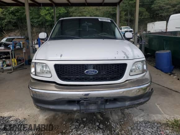 2002 Ford F-150 XLT with VIN 1FTRW07L42KB41425, listed as a Copart auction lot 69473745 with Not provided miles and Salvage title. Bid and sale history available at DreamBid. Image 5.