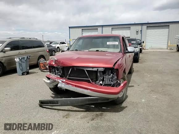 2000 Chevrolet Silverado 1500 LS with VIN 2GCEC19V0Y1220370, listed as a Copart auction lot 53490065 with 187,475 mi miles and Salvage title. Bid and sale history available at DreamBid. Image 13.
