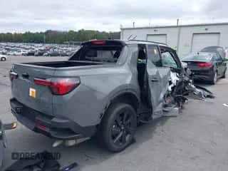 2023 Hyundai Santa Cruz Night Edition with VIN 5NTJCDAF3PH051898, listed as a IAAI auction lot 42947027 with 17,273 mi miles and . Bid and sale history available at DreamBid. Image 4.
