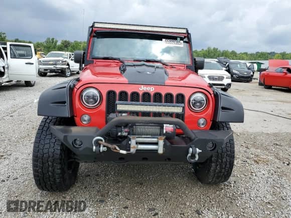 2014 Jeep Wrangler Sahara z VIN 1C4AJWBG0EL148282, wystawiony jako Copart lot #65809385 z przebiegiem 122 443 mil mil oraz Szkoda całkowita • Salvage title. Historia ofert i sprzedaży dostępna na DreamBid. Obrazek 5.