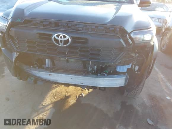 2024 Toyota Tacoma SR5 with VIN 3TYLB5JN3RT032583, listed as a IAAI auction lot 41404527 with 7,130 mi miles and . Bid and sale history available at DreamBid. Image 6.