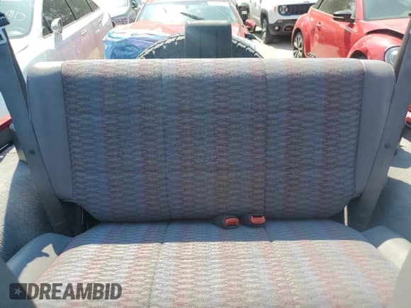 1998 Jeep Wrangler Sport z VIN 1J4FY19S9WP761133, wystawiony jako Copart lot #65012245 z przebiegiem 200 759 mil mil oraz Szkoda całkowita • Salvage title. Historia ofert i sprzedaży dostępna na DreamBid. Obrazek 10.