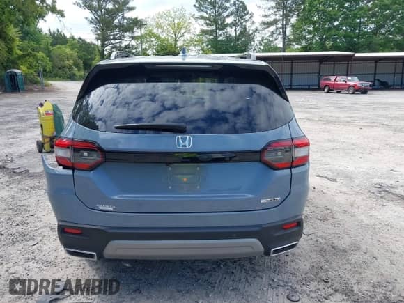 2025 Honda Pilot Touring with VIN 5FNYG2H70SB011614, listed as a IAAI auction lot 42205848 with 37,719 mi miles and . Bid and sale history available at DreamBid. Image 16.