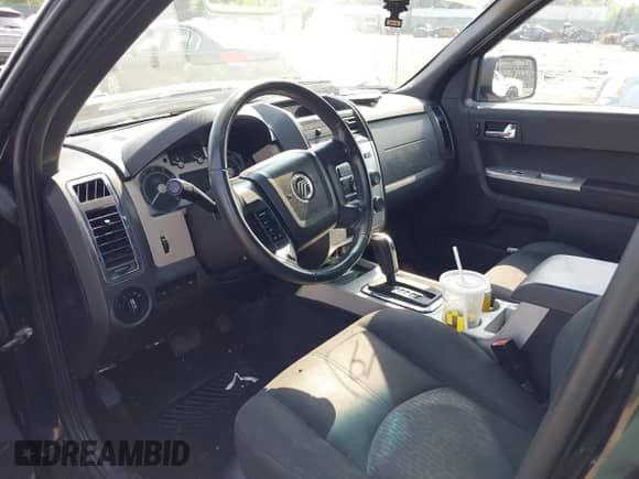 2008 Mercury Mariner with VIN 4M2CU91188KJ15291, listed as a IAAI auction lot 42378294 with 160,223 mi miles and . Bid and sale history available at DreamBid. Image 12.