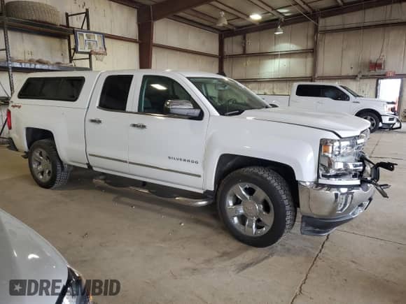 2017 Chevrolet Silverado 1500 LTZ with VIN 1GCVKSEC1HZ360805, listed as a Copart auction lot 55312555 with 80,086 mi miles and Salvage title. Bid and sale history available at DreamBid. Image 4.