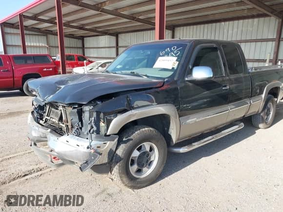 2002 GMC Sierra 1500 SLE z VIN 2GTEK19T921324722, wystawiony jako IAAI lot #42809457 z przebiegiem 280 445 mil mil oraz . Historia ofert i sprzedaży dostępna na DreamBid. Obrazek 2.