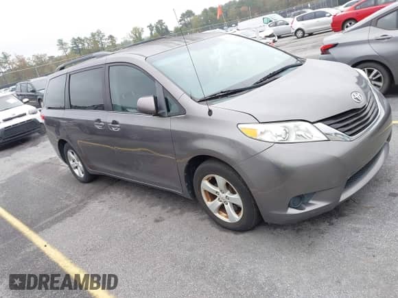 2012 Toyota Sienna LE with VIN 5TDKK3DC2CS262161, listed as a IAAI auction lot 43543505 with 218,722 mi miles and . Bid and sale history available at DreamBid. Image 1.