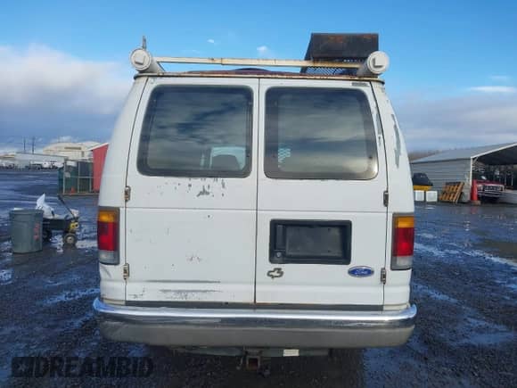 1992 Ford Econoline Cargo with VIN 1FTHS24H5NHB42507, listed as a IAAI auction lot 41512347 with 373,987 mi miles and . Bid and sale history available at DreamBid. Image 16.