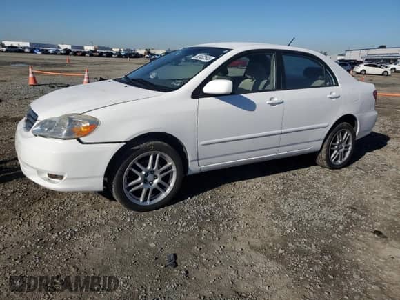 2003 Toyota Corolla LE with VIN 1NXBR32E83Z118296, listed as a Copart auction lot 82462505 with 155,356 mi miles and Salvage title. Bid and sale history available at DreamBid. Image 1.