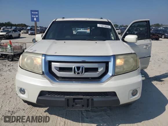2011 Honda Pilot Touring с VIN 5FNYF3H93BB053642, выставлен на аукционе Copart как лот 71074825 с пробегом 171 403 миль миль и Списание • Salvage title. История ставок и продаж доступна на DreamBid. Изображение 5.