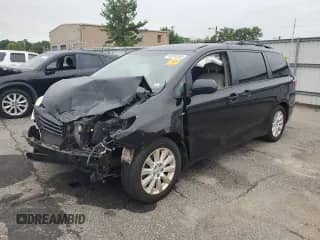 2016 Toyota Sienna LE with VIN 5TDJK3DC2GS132866, listed as a Copart auction lot 69240355 with 92,725 mi miles and Salvage title. Bid and sale history available at DreamBid. Image 1.