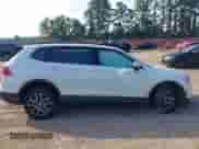 2021 Volkswagen Tiguan SE с VIN 3VV3B7AX2MM082054, выставлен на аукционе IAAI как лот 43195386 с пробегом 102 119 миль миль и . История ставок и продаж доступна на DreamBid. Изображение 14.